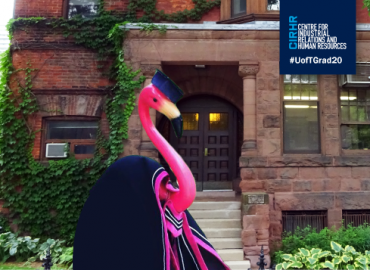 CIRHR house with a flamingo in a convocation gown and hood